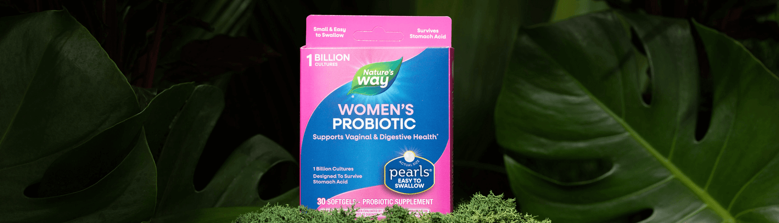 Nature's Way Women's Probiotic Pearls on leafy background