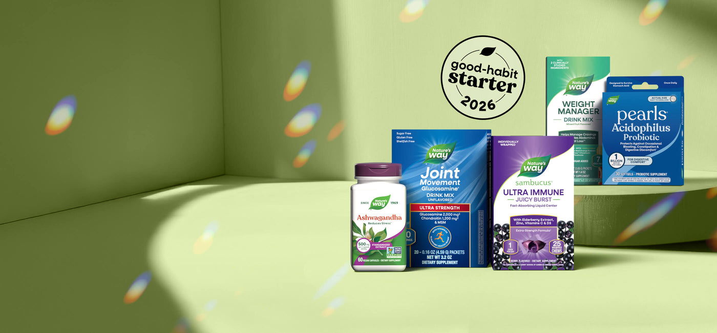 Vitamins and supplements on a green surface with a 'Good-Habit Starter' label.
